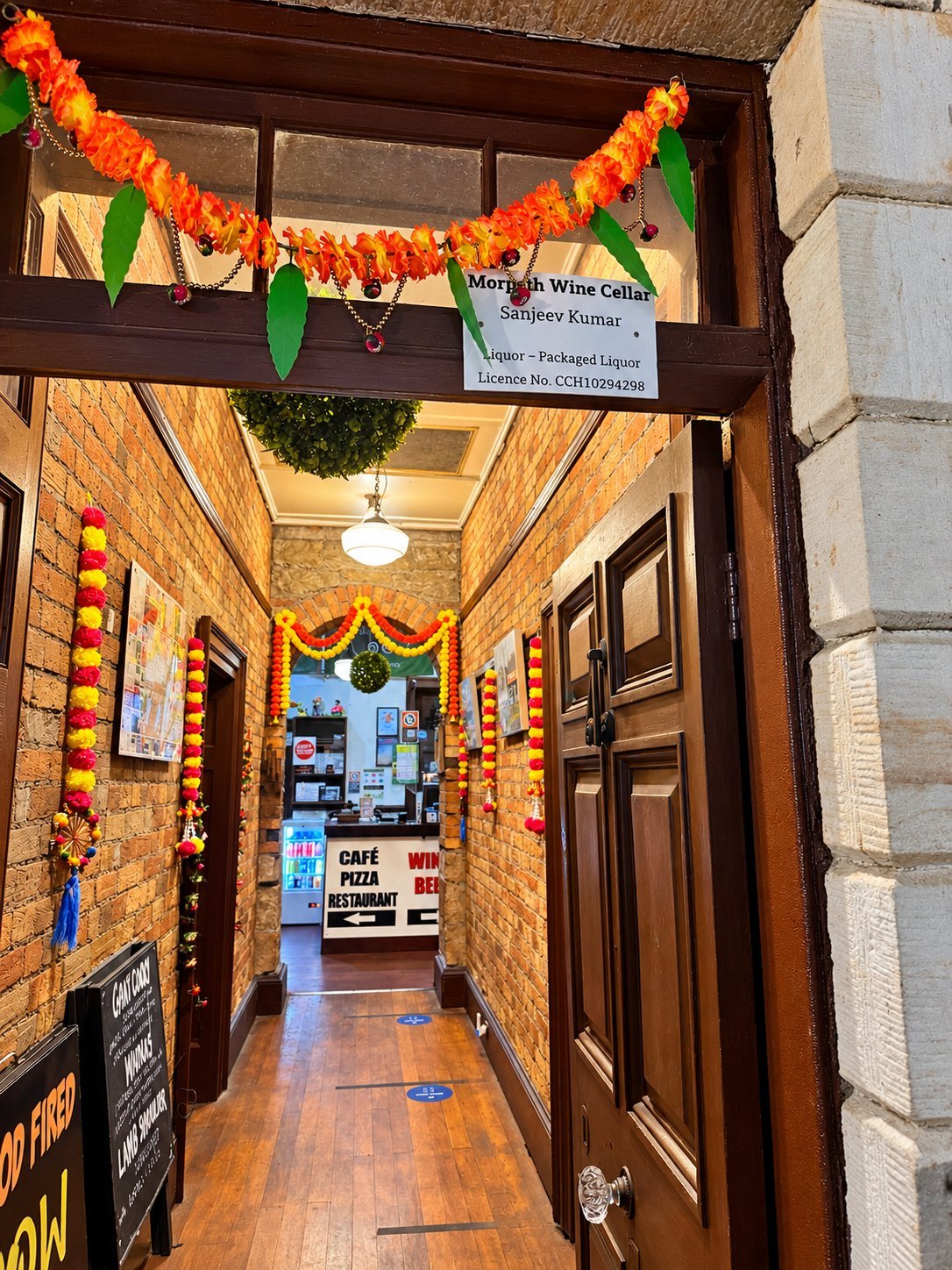 Entrance to Morpeth Woodfire Pizza & Indian Delicacies on Swan Street, Morpeth NSW